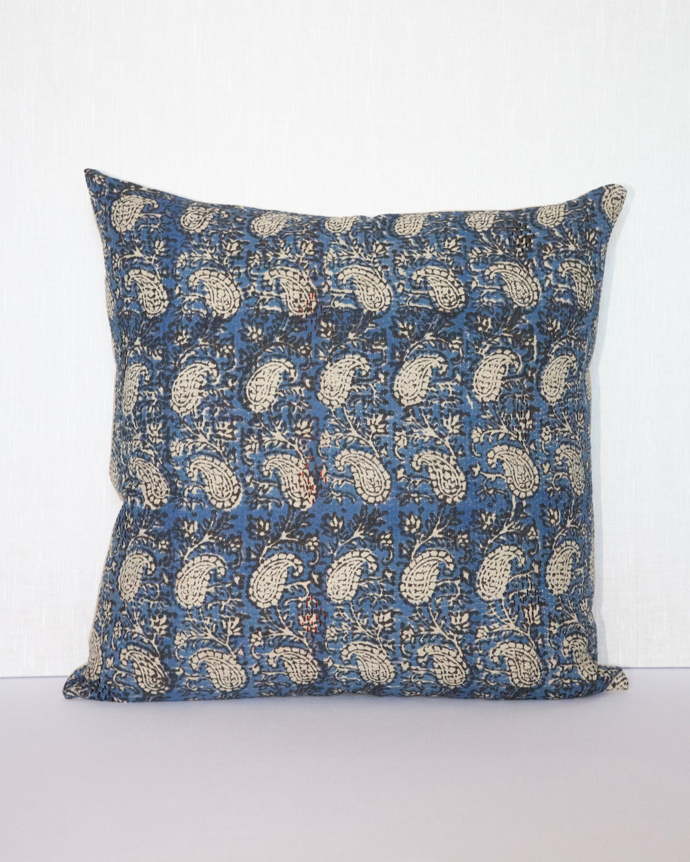 Vintage Kantha Cushion Cover with traditional Bagru block print in indigo tones, showcasing intricate hand-stitched patterns, displayed on a white background.