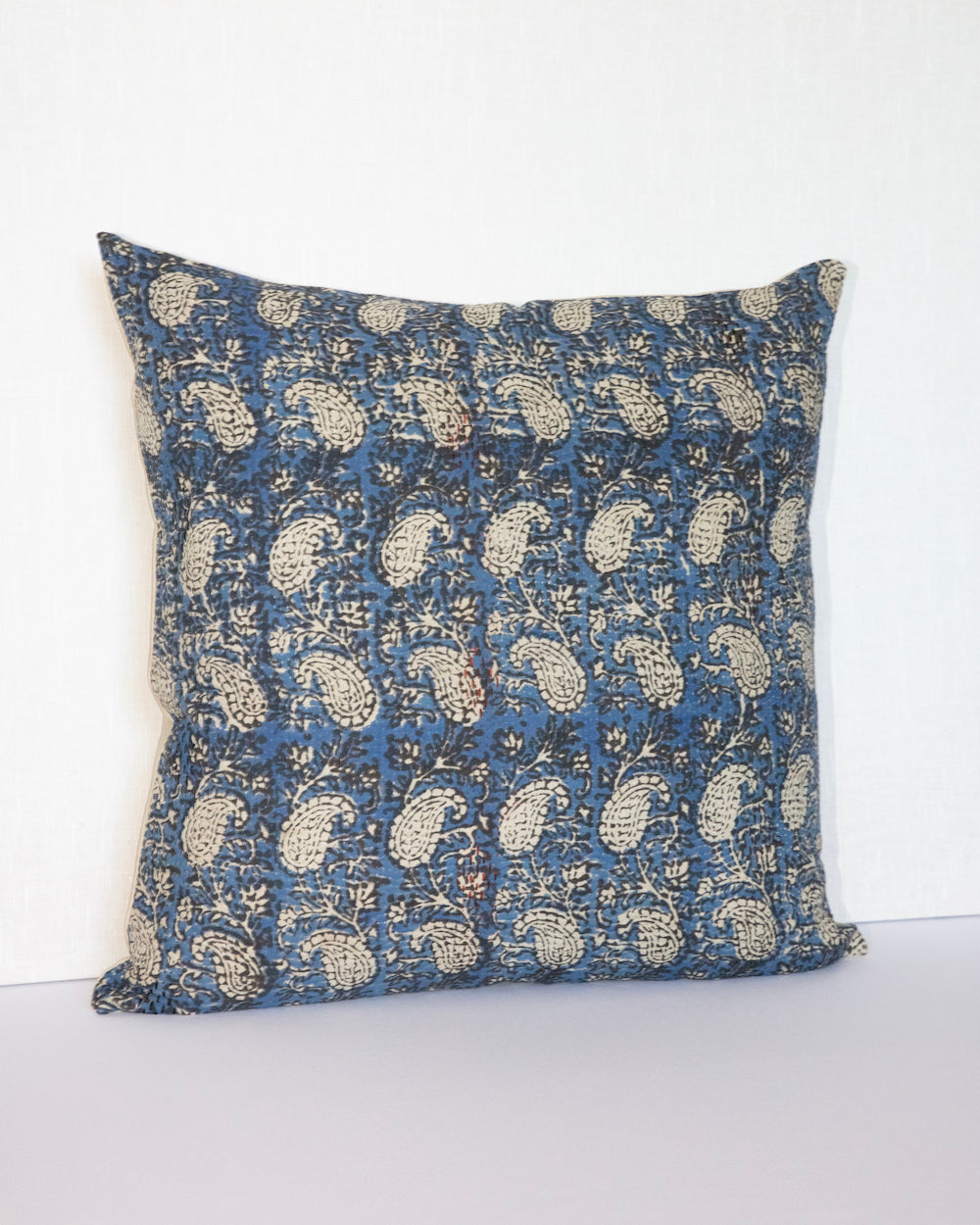 Vintage Kantha Cushion Cover with traditional Bagru block print in indigo tones, showcasing intricate hand-stitched patterns, displayed on a white background.