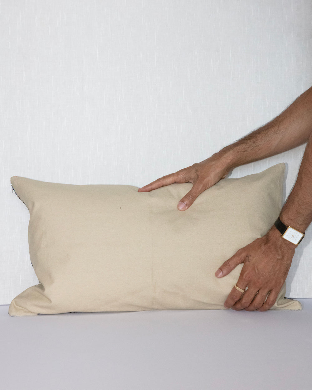 Handcrafted vintage Kantha pillow featuring a indigo paisley block print design, adding bohemian and rustic charm to any room. The rectangular cushion is made from repurposed fabrics, reflecting traditional Indian craftsmanship