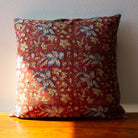 Garent Vintage Kantha Cushion Cover with traditional Bagru block print in rusty red tones, showcasing intricate hand-stitched patterns, displayed on a white background.