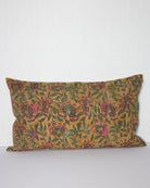 Handcrafted vintage Kantha pillow featuring a ochre and rust floral block print design, adding bohemian and rustic charm to any room. The rectangular cushion is made from repurposed fabrics, reflecting traditional Indian craftsmanship