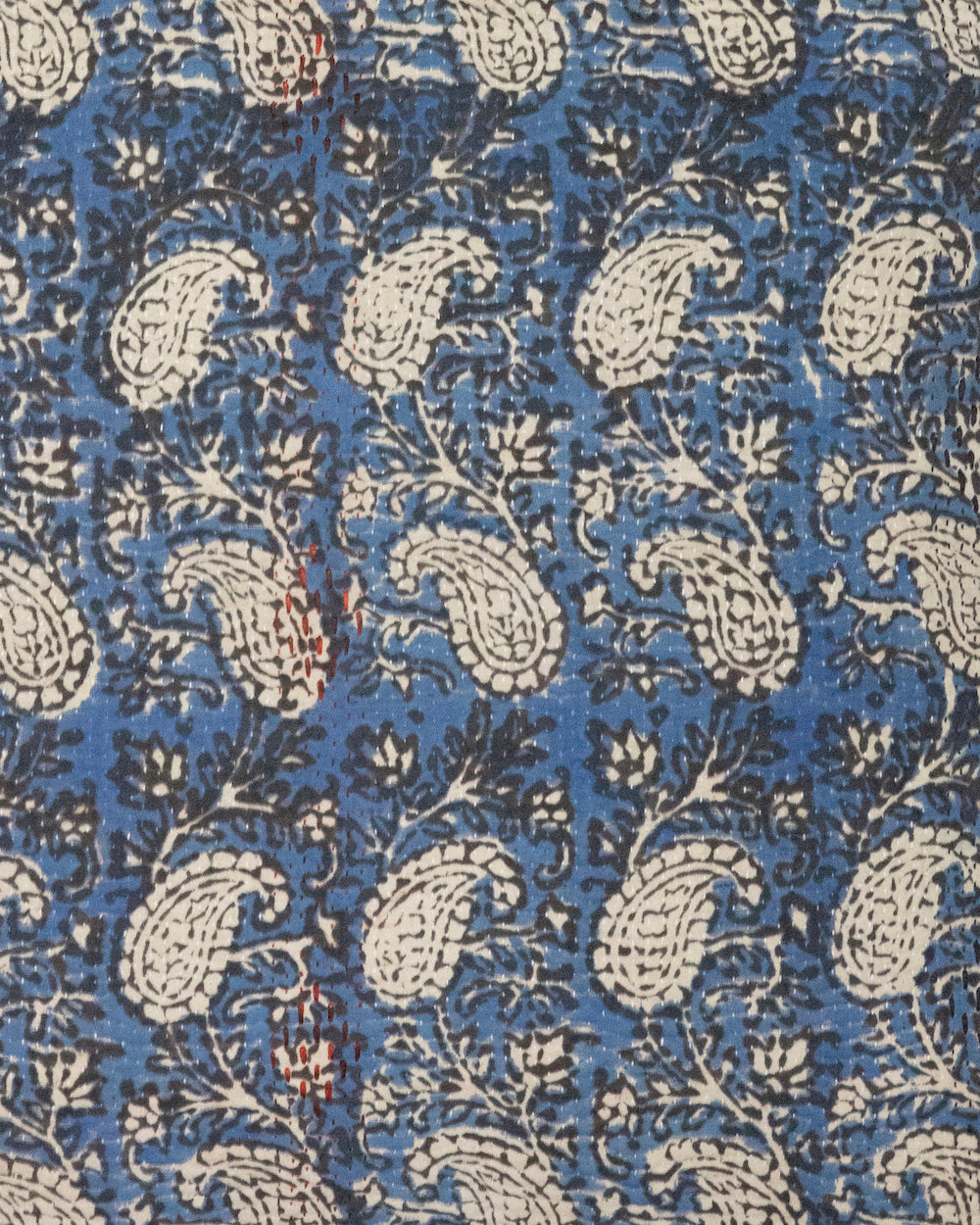 close up Vintage Kantha Cushion Cover with traditional Bagru block print in indigo tones, showcasing intricate hand-stitched patterns